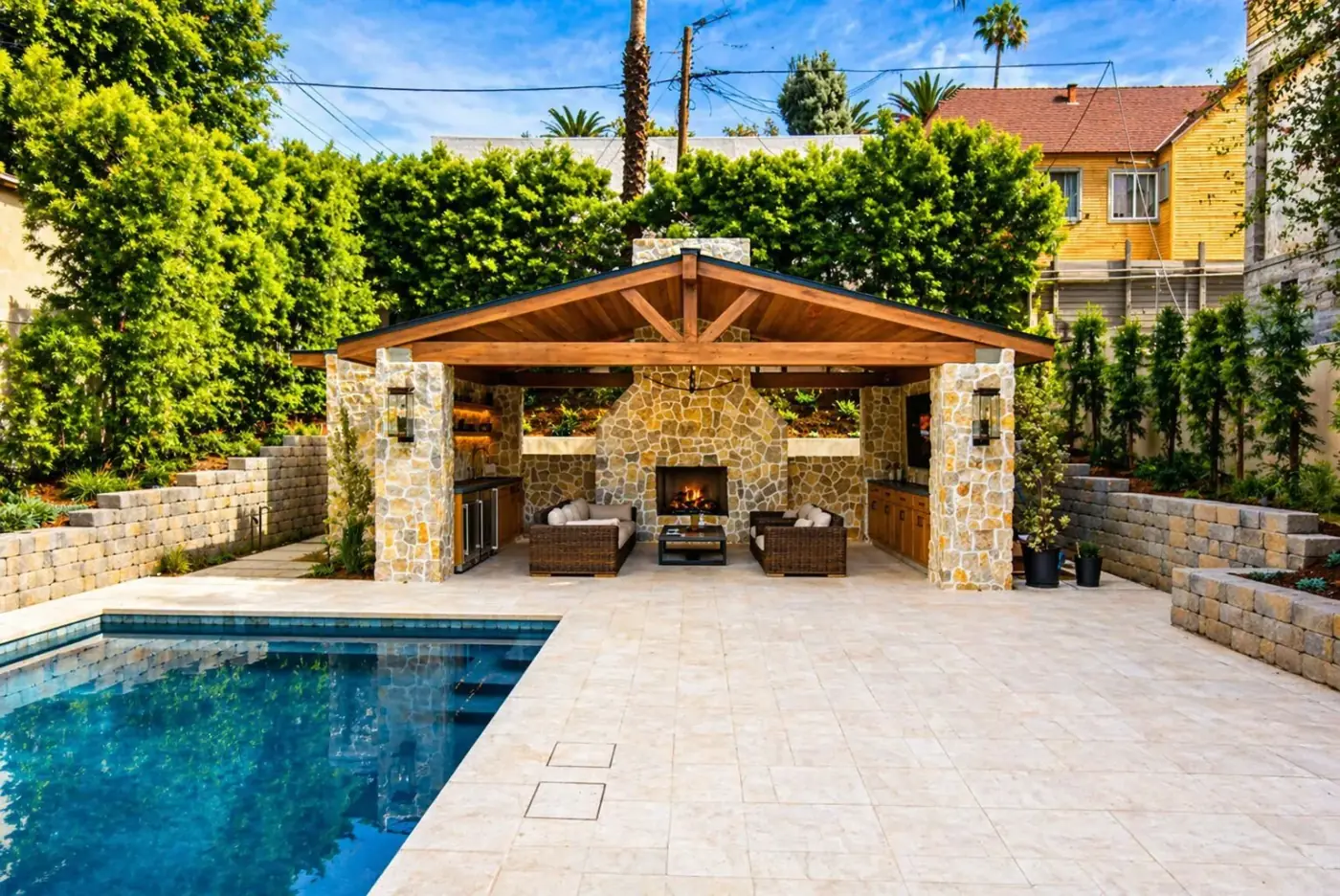Poolside Pergola with Fireplace & Kitchen by Moda Outdoor Living in Silver Lake, CA — luxury outdoor living design and build
