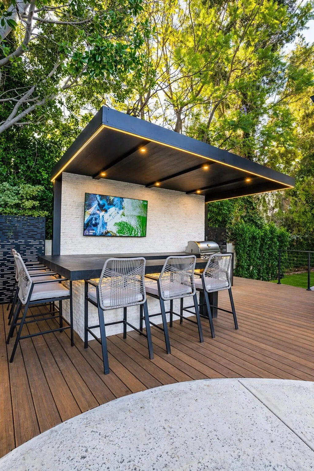 Outdoor Kitchen & Bar with Deck by Moda Outdoor Living in Porter Ranch, CA — luxury outdoor living design and build